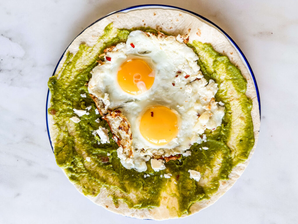 Crispy Feta Fried eggs on tortilla with avocado